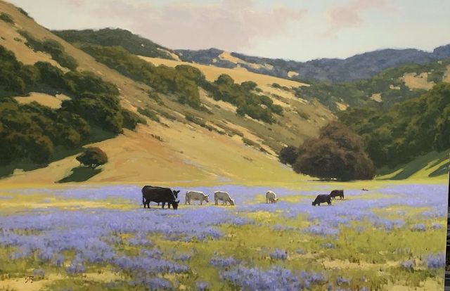 Landscape painting of cattle grazing in an open valley, used as the article cover